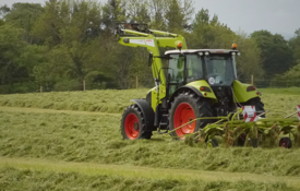 tractor mowing grass